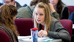 Female student looking confused